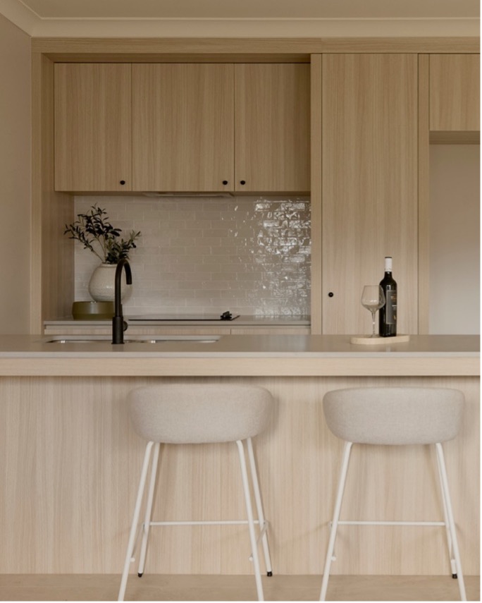 Nero Dolce Matte Black kitchen mixer and undermount sink in a light timber kitchen at Elwood by Azure
